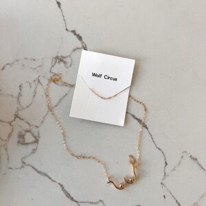 Wolf Circus Gold Boob Necklace